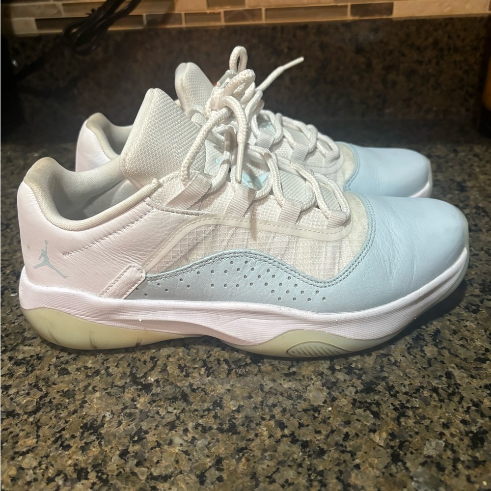 Jordan Women’s 11 CMFT Low-Profile Sneakers in Light Blue and White